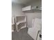 Spacious walk-in closet with white shelving and storage solutions for organizing clothes and accessories at 6207 W 92Nd Pl, Westminster, CO 80031