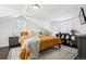 Cozy bedroom featuring a bed, modern nightstand, rug, and windows at 1535 Spruce St, Denver, CO 80220