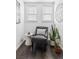 Cozy sitting area with chair, decor and lots of natural light at 1535 Spruce St, Denver, CO 80220