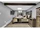 Bedroom featuring a queen-sized bed, window for natural light, and neutral carpeting at 8885 W 64Th Pl, Arvada, CO 80004