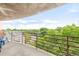 Spacious balcony area with city and treetop views at 5955 E 10Th Ave # 507, Denver, CO 80220