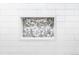 Close-up of the shower's inset shelf with a decorative mosaic-style pattern at 5955 E 10Th Ave # 507, Denver, CO 80220