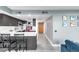 Modern kitchen with stainless steel appliances and a breakfast bar at 5955 E 10Th Ave # 507, Denver, CO 80220