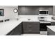 Stylish kitchen featuring sleek cabinets and quartz countertops at 5955 E 10Th Ave # 507, Denver, CO 80220