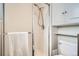 Updated shower with bright white shower and towel bar at 4272 E 126Th Pl, Thornton, CO 80241