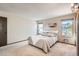Bright bedroom with neutral carpet, 2 large windows and space for a king sized bed at 4272 E 126Th Pl, Thornton, CO 80241