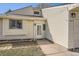 Close up of this home's entry featuring attractive trim, windows and a solid front door at 4272 E 126Th Pl, Thornton, CO 80241