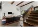 Recreational space featuring wood beams, ping pong table, and inviting leather seating at 50 Albion St, Denver, CO 80220