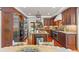 Open concept kitchen with modern appliances, a center island, and hardwood floors, ideal for cooking and entertaining at 50 Albion St, Denver, CO 80220