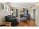 Living room with a sofa, chair, ottoman and fireplace at 50 Albion St, Denver, CO 80220
