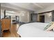 Bright main bedroom featuring a fireplace, television, and comfortable bed at 50 Albion St, Denver, CO 80220