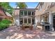 A charming outdoor patio features comfortable seating, a grill, and ample space for entertaining guests at 50 Albion St, Denver, CO 80220