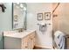 Bathroom featuring a marble countertop vanity and a glass door shower at 2012 W 101St Ave, Thornton, CO 80260