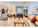 Open floor plan view of the living room and dining area with neutral decor and plenty of natural light at 2012 W 101St Ave, Thornton, CO 80260