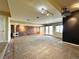 Finished basement features a cozy fireplace and large windows for natural light at 8461 Pawnee Ln, Niwot, CO 80503