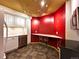 Kitchen with modern appliances, gray cabinets, and a cozy breakfast bar at 8461 Pawnee Ln, Niwot, CO 80503