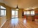 Eat in kitchen featuring hardwood floors, stainless appliances, and lots of natural light at 8461 Pawnee Ln, Niwot, CO 80503