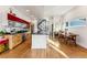 Modern kitchen and dining area, featuring sleek countertops and contemporary design elements at 4129 Zenobia St, Denver, CO 80212