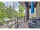 Cozy balcony with seating area and views of lush greenery and neighborhood at 1495 W 137Th Ave, Broomfield, CO 80023