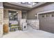 Inviting front porch with stone pillars and outdoor seating area at 1495 W 137Th Ave, Broomfield, CO 80023
