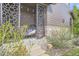 Charming patio with unique decorative panels, inviting chairs, and cozy lighting at 1495 W 137Th Ave, Broomfield, CO 80023