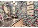 Chic powder room with designer wallpaper, a unique mirror, and stylish fixtures at 1495 W 137Th Ave, Broomfield, CO 80023