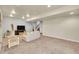 Large basement living room with a neutral color scheme, plush carpet, and recessed lighting at 6829 Juniper Ct, Frederick, CO 80530