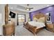 Spacious main bedroom boasting stylish decor, a tray ceiling, and lots of light at 6829 Juniper Ct, Frederick, CO 80530
