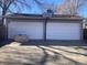Detached two-car garage with a basketball hoop, providing ample parking and recreational opportunities at 2101 S Lowell Blvd, Denver, CO 80219