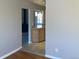 Bright living room with hardwood floors and neutral wall paint at 2101 S Lowell Blvd, Denver, CO 80219