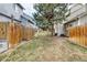 Backyard with lush grass and fence at 3849 E 121St Ave, Thornton, CO 80241