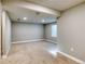 Spacious basement area with neutral carpet and paint, perfect for flexible living at 3849 E 121St Ave, Thornton, CO 80241