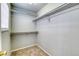 Walk-in closet with metal shelving for clothing and storage at 3849 E 121St Ave, Thornton, CO 80241
