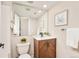Renovated bathroom featuring stylish vanity, updated fixtures, and modern design elements at 19595 Mitchell Dr, Denver, CO 80249