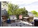 Inviting back deck with outdoor seating, perfect for relaxing and enjoying the backyard views at 10218 Woodrose Ct, Highlands Ranch, CO 80129