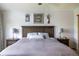 Comfortable main bedroom with neutral color scheme, elegant decor, and matching nightstands at 10218 Woodrose Ct, Highlands Ranch, CO 80129