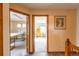 Hallway with two rooms that include a Sewing Room and a Crafting Room at 10218 Woodrose Ct, Highlands Ranch, CO 80129