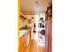 Well-organized pantry with shelving, wine rack, and charming decor details at 10218 Woodrose Ct, Highlands Ranch, CO 80129