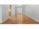 Bright dining room with hardwood floors and sliding glass doors to the outside at 1844 S Pontiac Way, Denver, CO 80224