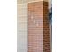 Close up of the house number, 1844, displayed on a brick column near the garage at 1844 S Pontiac Way, Denver, CO 80224
