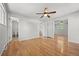Spacious main bedroom features hardwood floors and mirrored closets at 1844 S Pontiac Way, Denver, CO 80224