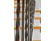 Close-up shot of a wrought iron railing with hardwood stairs in the background at 1844 S Pontiac Way, Denver, CO 80224
