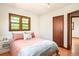 Bedroom with hardwood floors, one window, and a bed at 510 16Th St, Golden, CO 80401