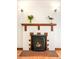 Detailed view of a classic fireplace with unique detailing and a decorative mantle at 510 16Th St, Golden, CO 80401