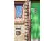 Close-up of the front entrance with unique architectural details and vintage hardware at 510 16Th St, Golden, CO 80401