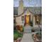 Inviting home entrance with brick facade, manicured landscaping, and a well-lit doorway at 510 16Th St, Golden, CO 80401