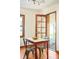 Bright kitchen features a window overlooking the backyard and a door leading to the outdoor patio at 510 16Th St, Golden, CO 80401