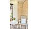 Sunroom featuring large windows, brick walls, and wicker furniture at 510 16Th St, Golden, CO 80401