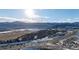 Aerial view of neighborhood with mountain views at 8946 W Teton Cir, Littleton, CO 80128