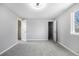 Bedroom with gray walls, carpet, and a closet at 8946 W Teton Cir, Littleton, CO 80128